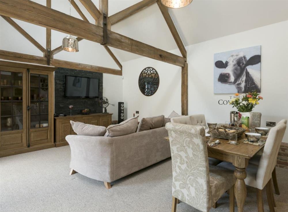 Appealing living and dining area at The Cowshed in Horning, near Wroxham, Norfolk
