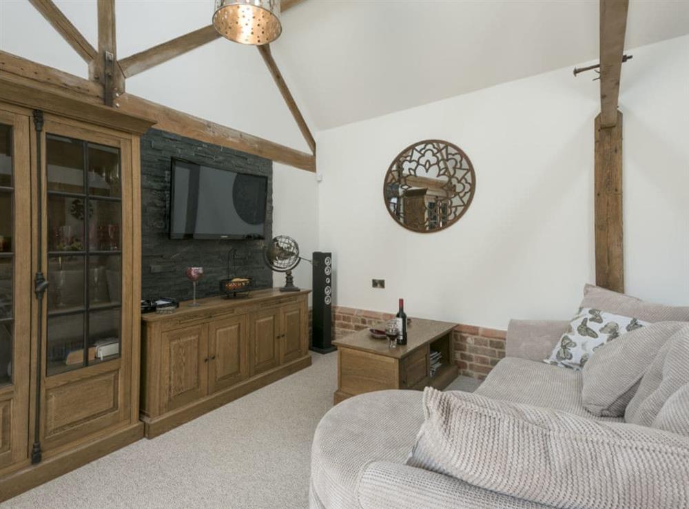 Comfy living area at The Cowshed in Horning, near Wroxham, Norfolk