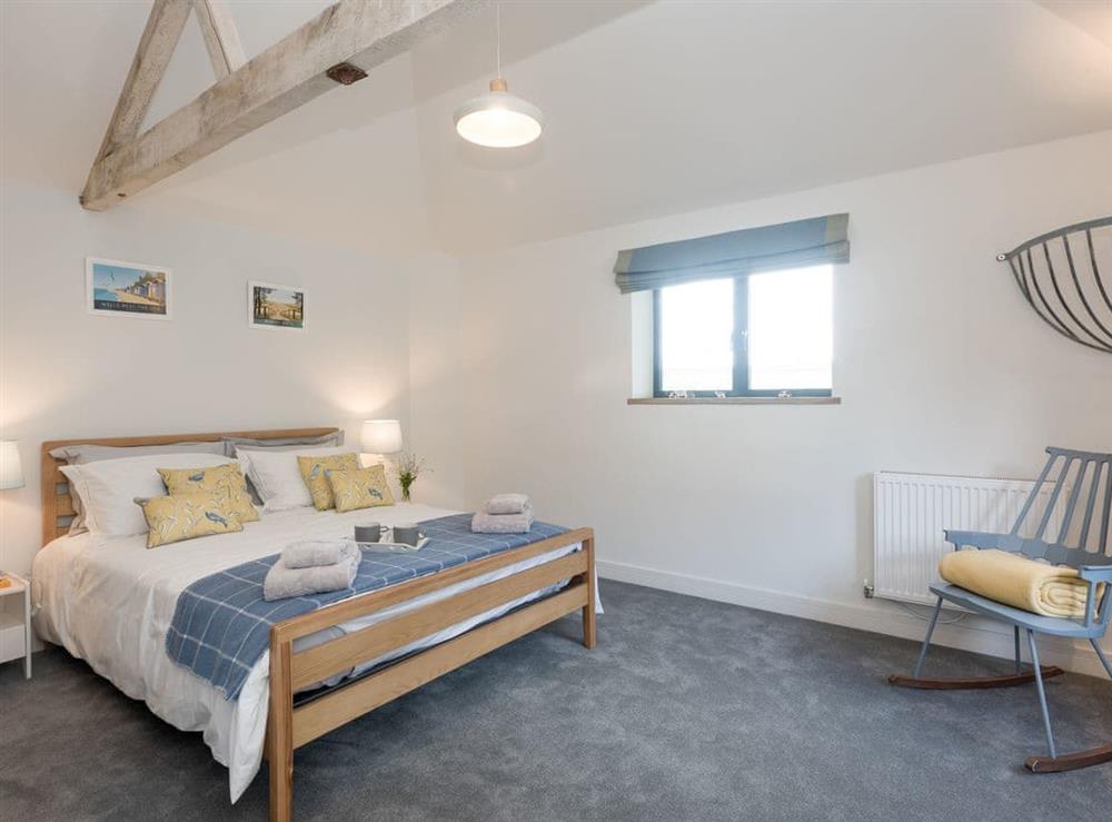 Relaxing en-suite double bedroom at The Cowshed in Reepham, Norfolk