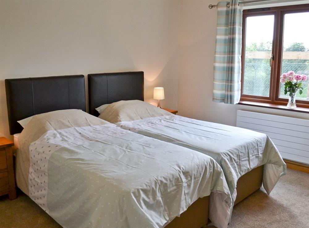 Twin bedroom at The Cowshed in Westfield, East Sussex