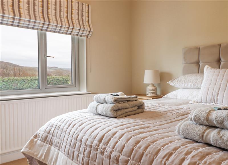 One of the bedrooms at The Crib, Penrhyn Bay