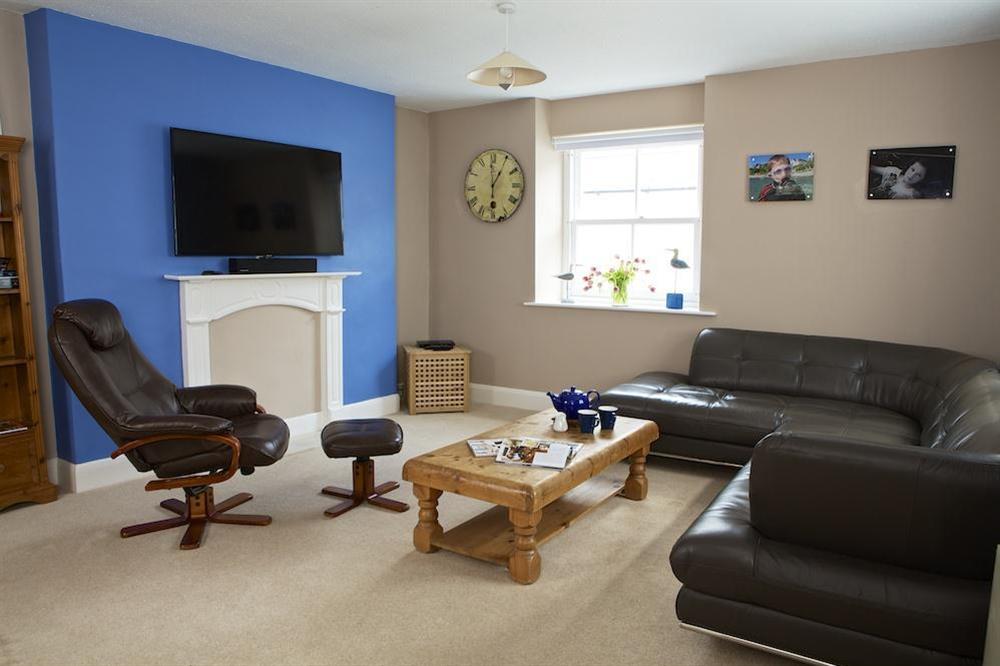 Bright open plan lounge with leather sofas (photo 2) at The Crows Nest in , Salcombe