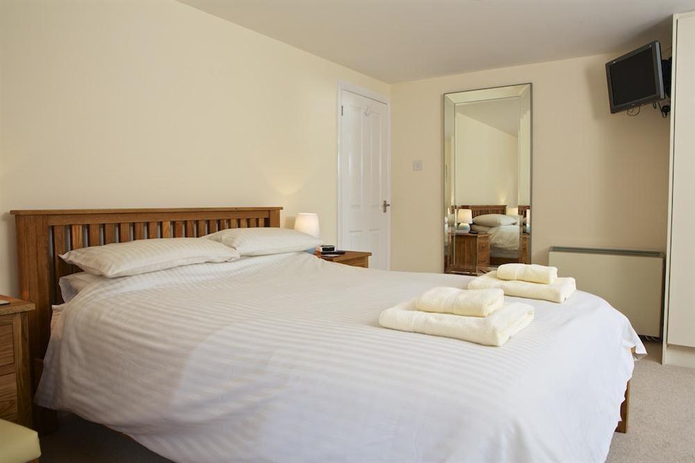 Master bedroom with King-size bed at The Crows Nest in , Salcombe