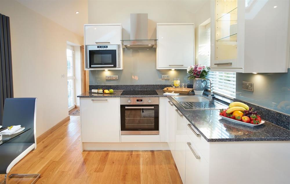 Open plan kitchen area at The Cwtch, Llanilid Pencoed