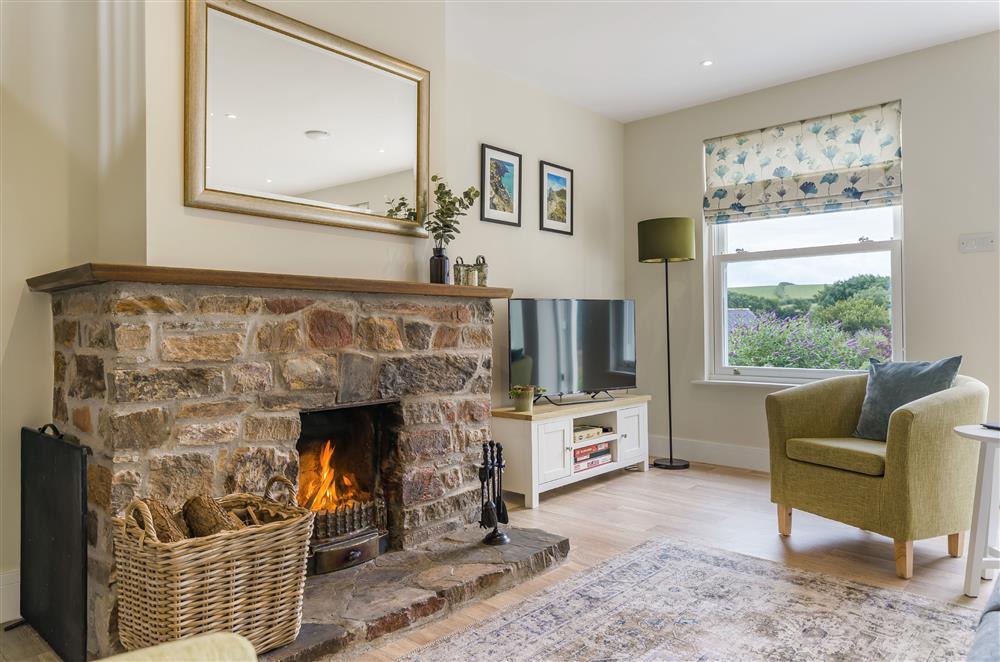 The open fire invites you to relax and unwind on chilly days at The Dairy, Braunton 