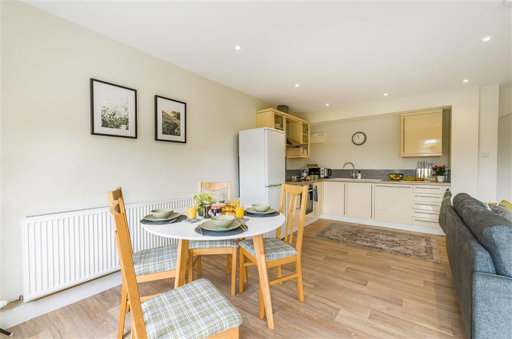 The open-plan kitchen with dining area, seating four guests at The Dairy, Braunton 