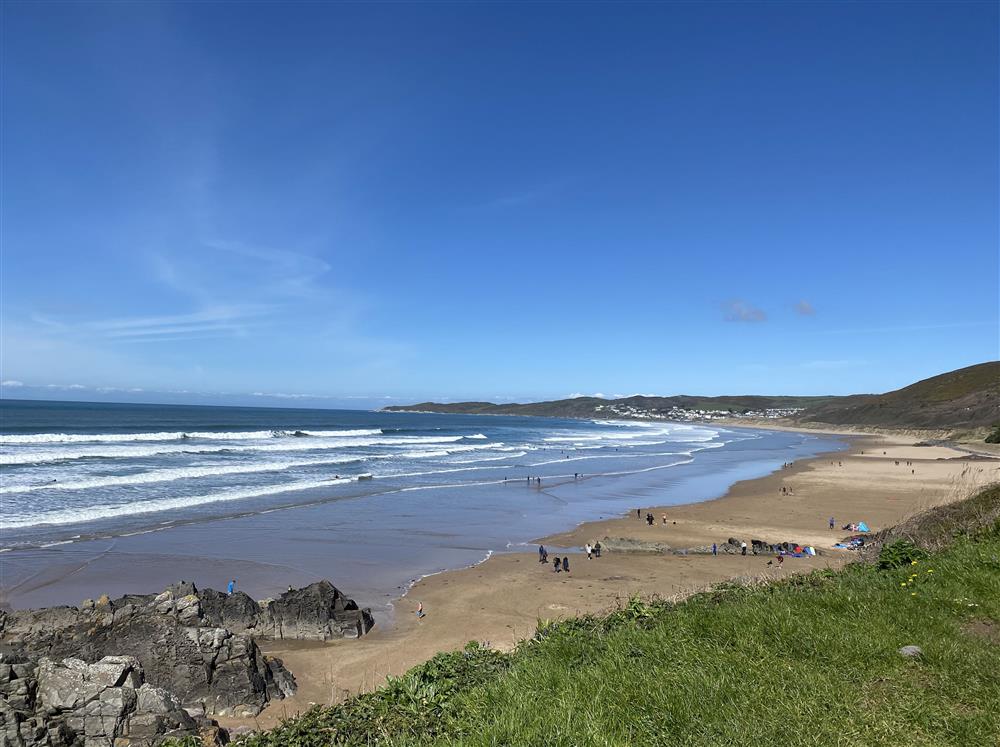 The view across to Woolacombe from Putsborough Beach at The Dairy, Braunton 