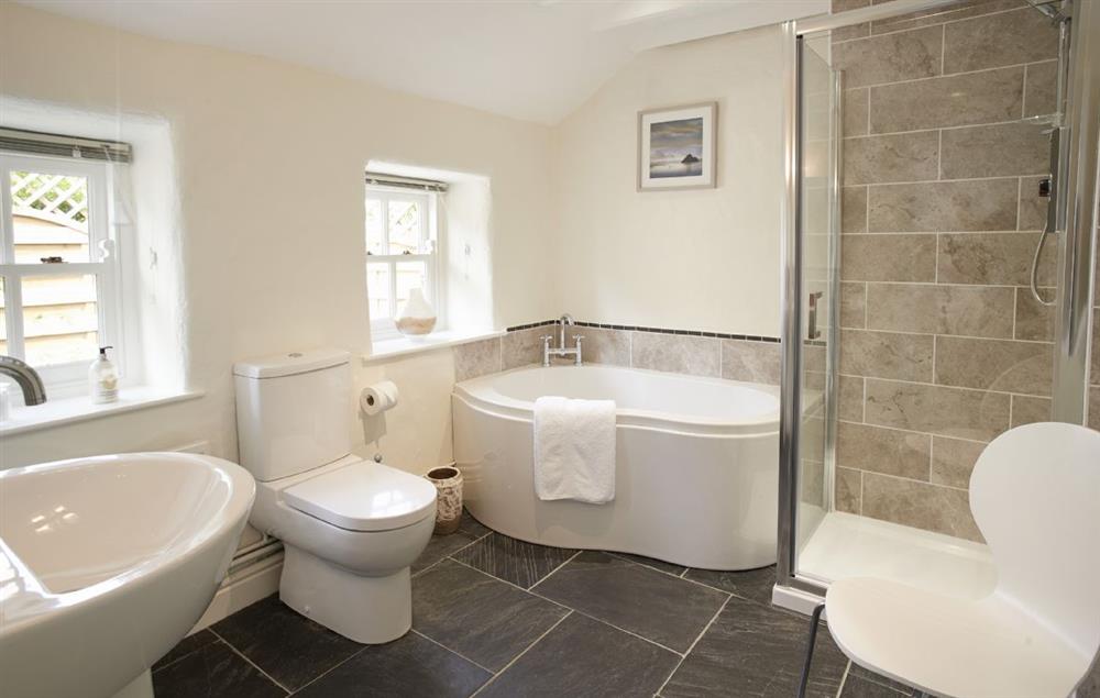 Bathroom with bath and separate walk in shower at The Dairy, Dinas Cross