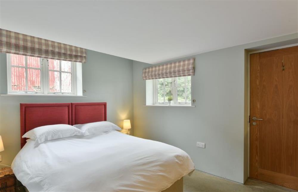 Double bedroom with 4’6 double bed and en suite bathroom at The Dairy, Freston