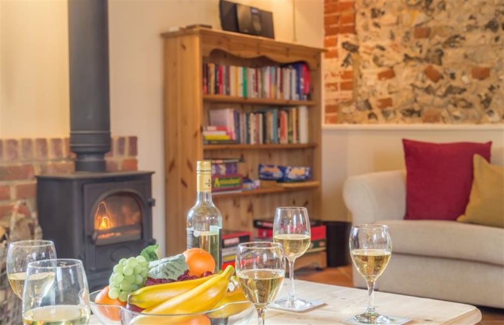 Ground Floor: Sitting room with wood burning stove at The Dairy, Great Massingham near Kings Lynn