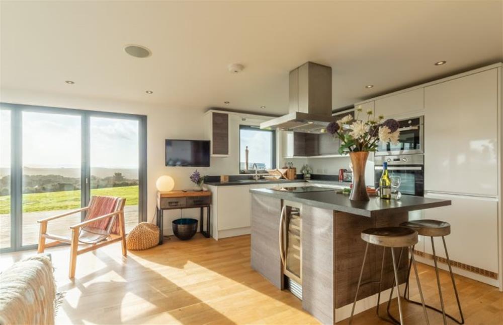 Modern centre island with breakfast bar at The Deck House, Chapel Porth, St Agnes