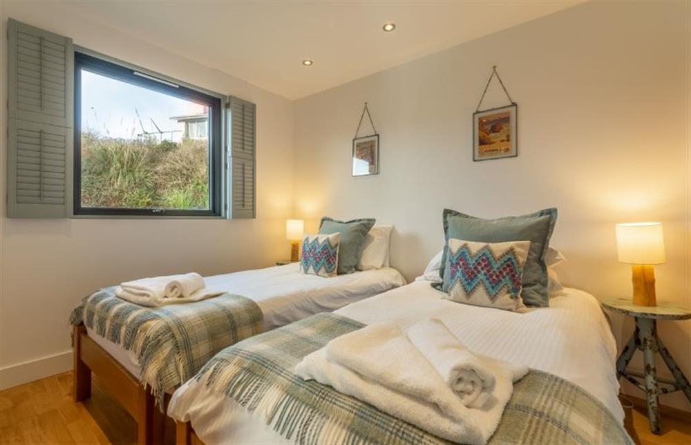 The Deck House, St Agnes. Bedroom two with twin beds at The Deck House, Chapel Porth, St Agnes