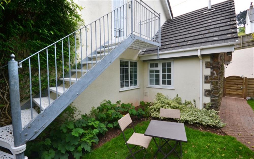 Another look at the private garden and stairs to entrance at The Dell Studio Apartment in Salcombe