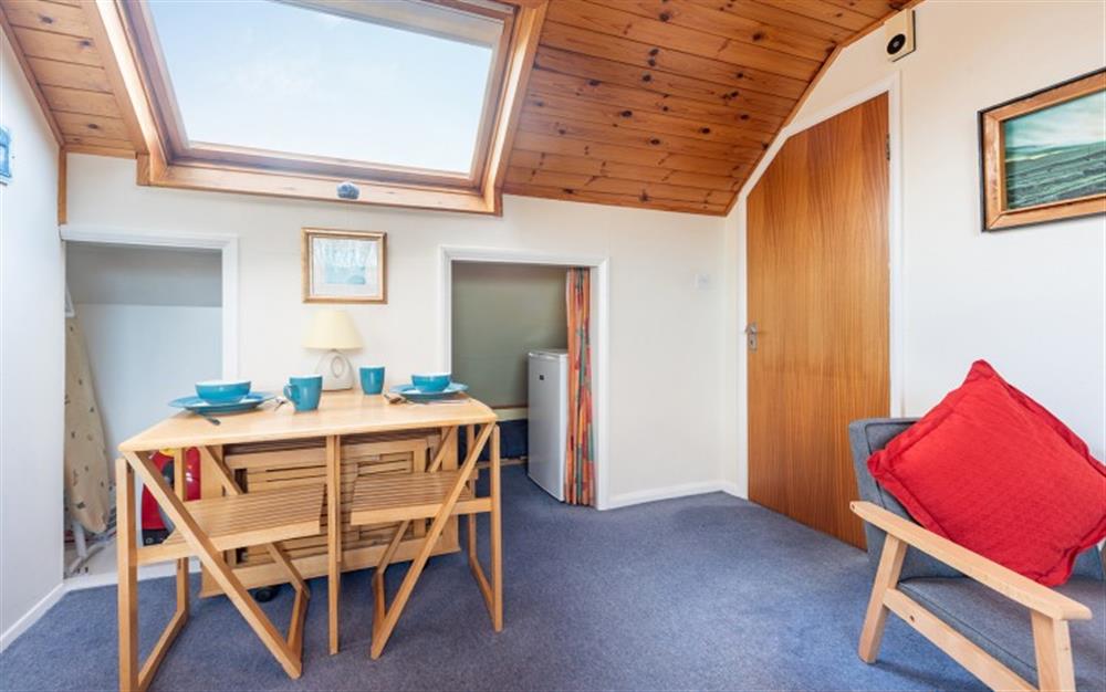 The dining area  at The Dell Studio Apartment in Salcombe