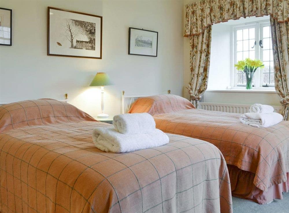 Comfortable twin bedroom at The Dovecote in Harrogate, Yorkshire, North Yorkshire