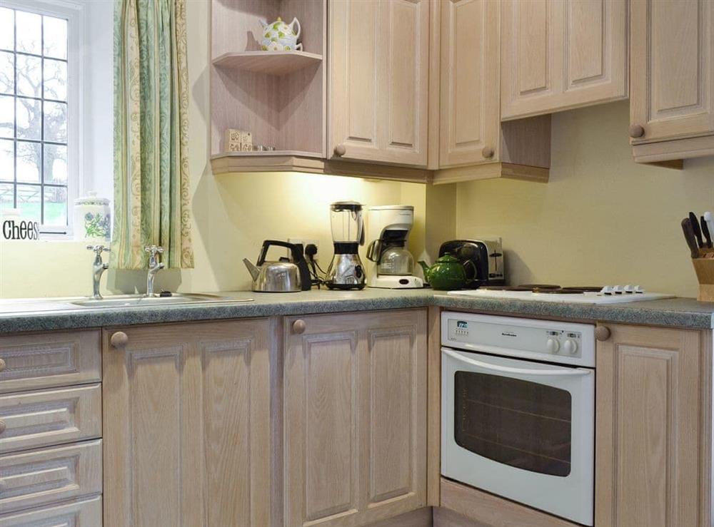 Well-equipped fitted kitchen at The Dovecote in Harrogate, Yorkshire, North Yorkshire