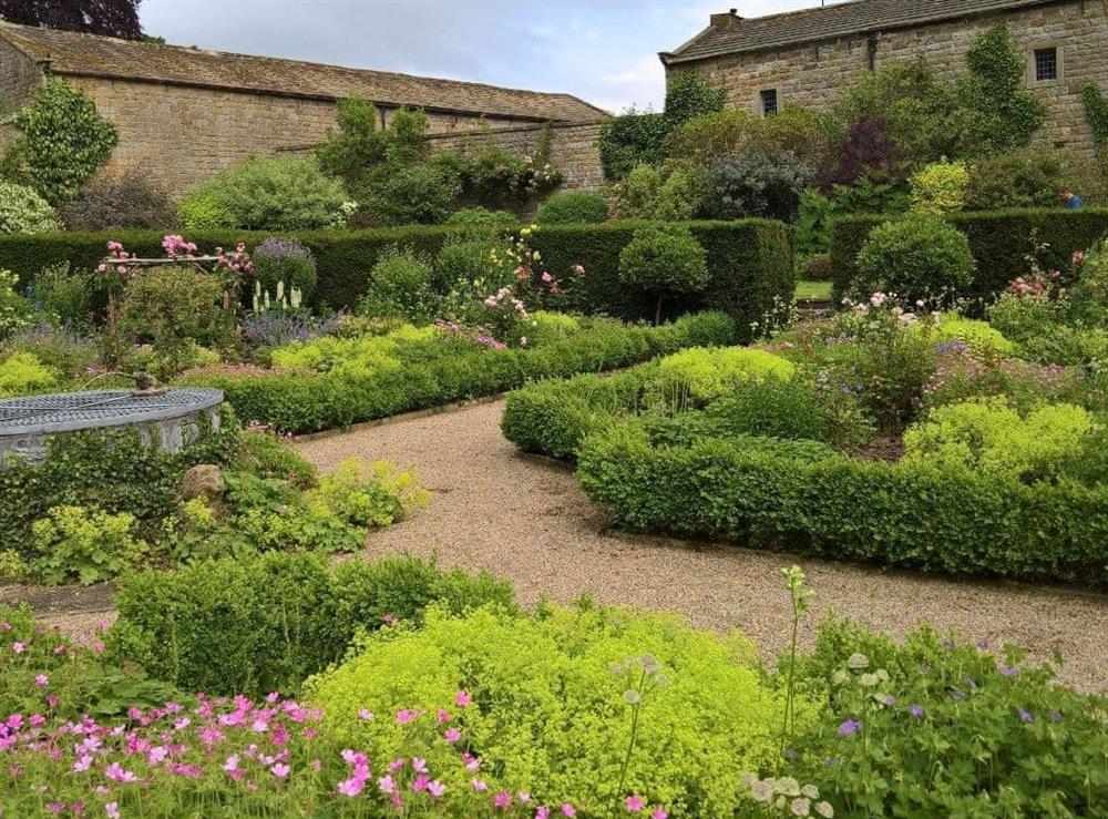 Well-maintained garden at The Dovecote in Harrogate, Yorkshire, North Yorkshire