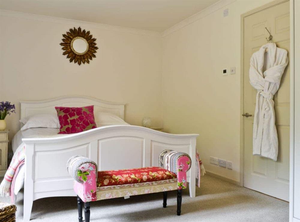 Double bedroom at The Downs Barn Lodge in Frampton Mansell, near Stroud, Gloucestershire