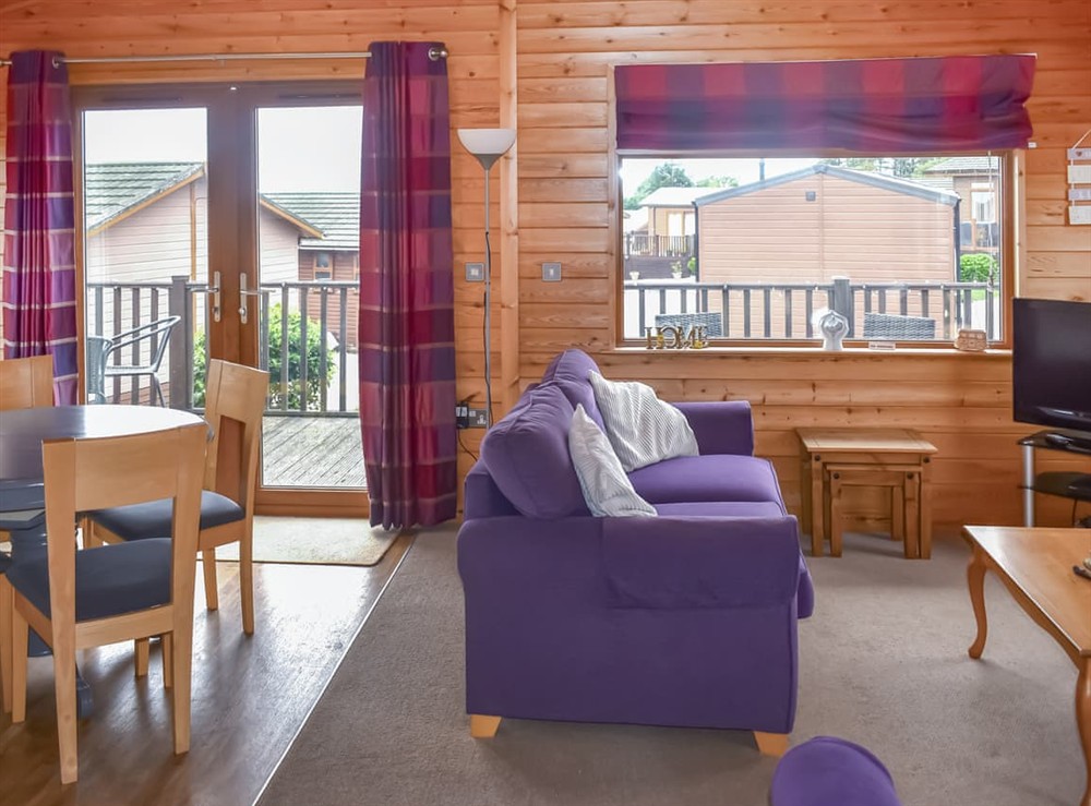 Open plan living space (photo 3) at The Dragons Den in Ilfracombe, Devon