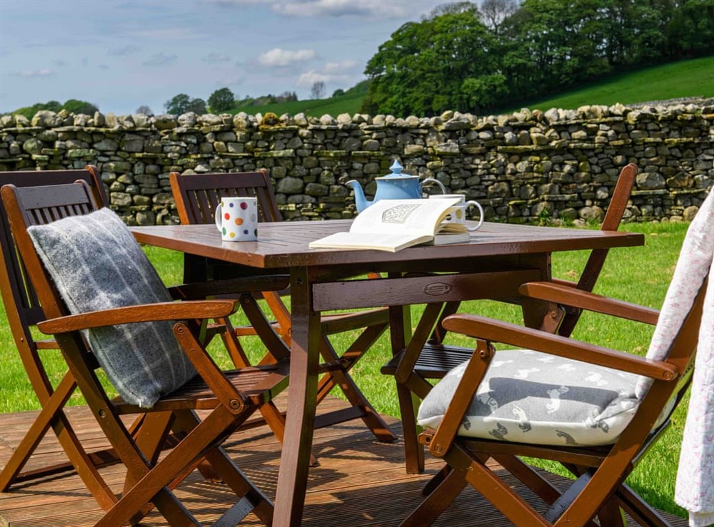 Outdoor eating area at The Driftwood Cabin in Hawes, North Yorkshire