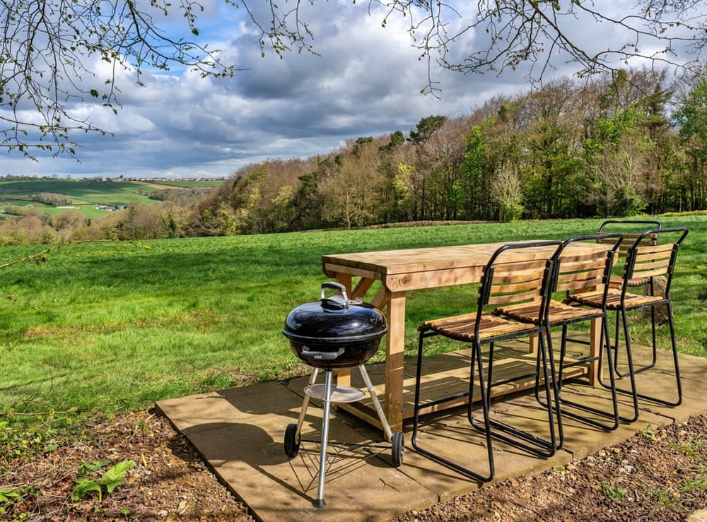 Outdoor eating area at The Driftwood Lodge in Bath, Avon