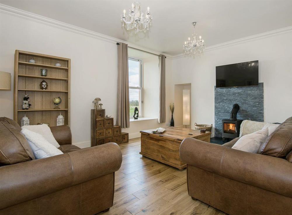 Luxurious living room with woodburner at The Duchy in Kirkcudbright, Kirkcudbrightshire