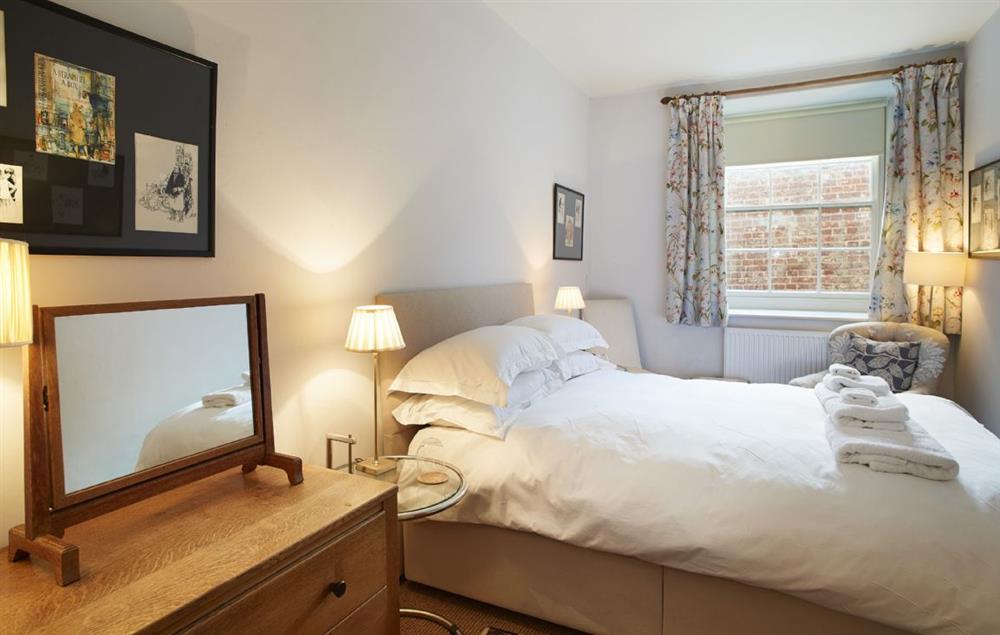 Bedroom with 4’6 double Vi spring bed on the lower ground floor at The East Wing, Aylsham near Norwich
