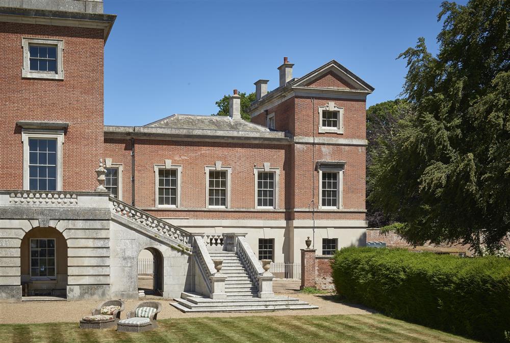 Occupying an entire wing of an impressive, Grade I listed Georgian Palladian house