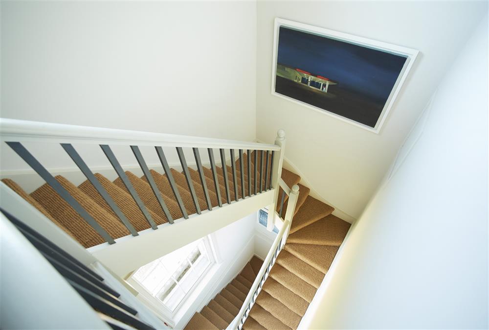 The elegant stairway leading to the second floor