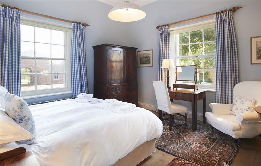 Ground floor double bedroom with luxury Vi Spring bed and views to the south at The East Wing, Wolterton