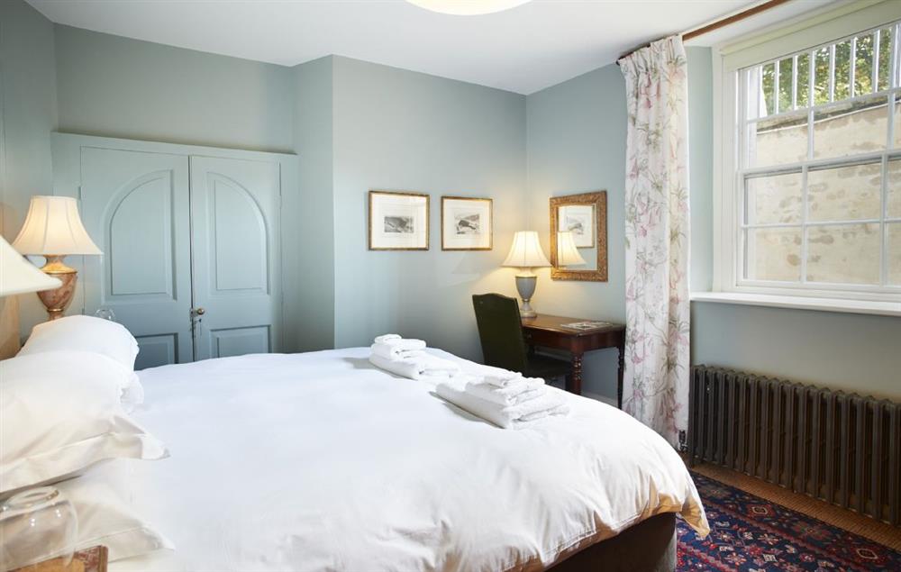 Large bedroom with 5’ king size bed on the lower ground floor at The East Wing, Wolterton