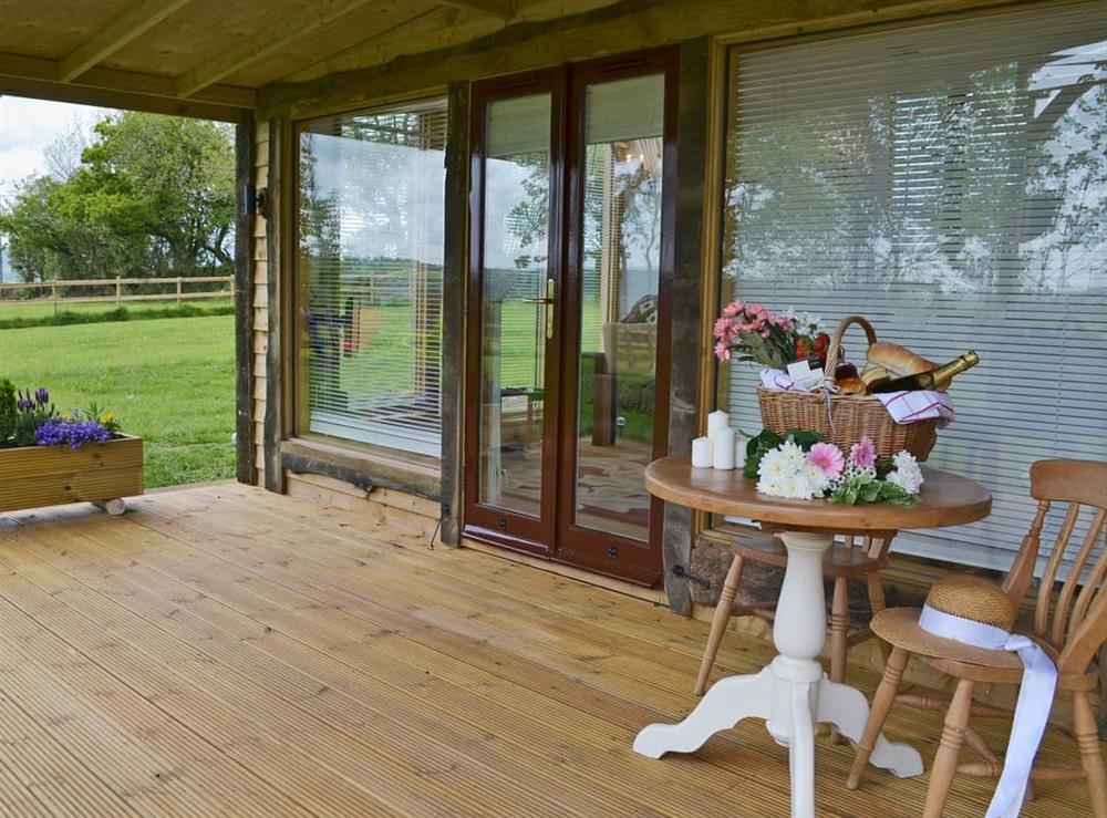 Relaxing veranda boasting wonderful views at The Escape in South Hill, near Callington, Cornwall