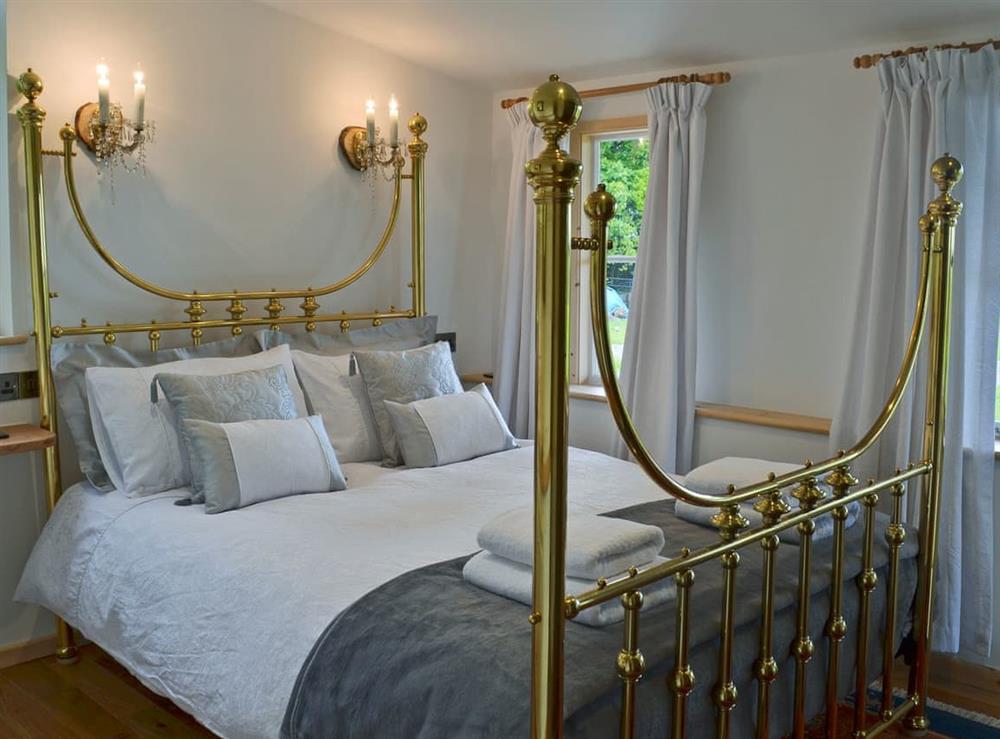 Romantic double bedroom with kingsize bed at The Escape in South Hill, near Callington, Cornwall