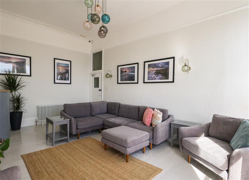 Relax in the living area at The Esplanade, Weymouth