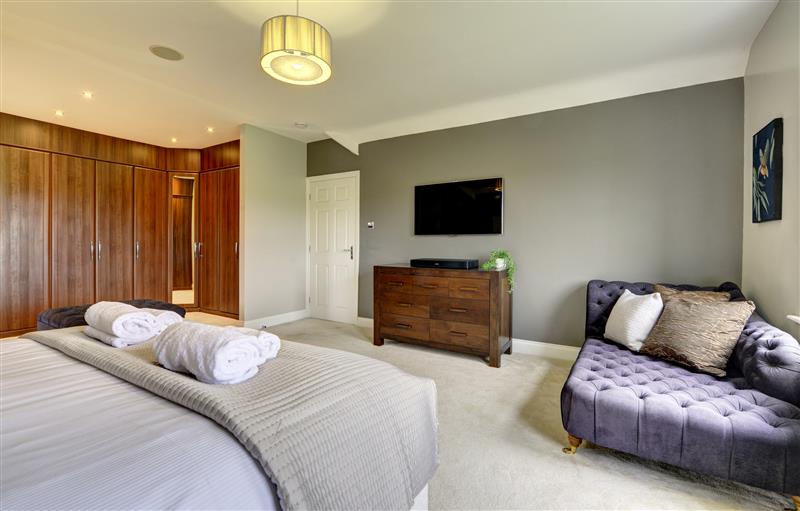 A bedroom in The Farm House (photo 4) at The Farm House, Aldbrough St. John near Barton