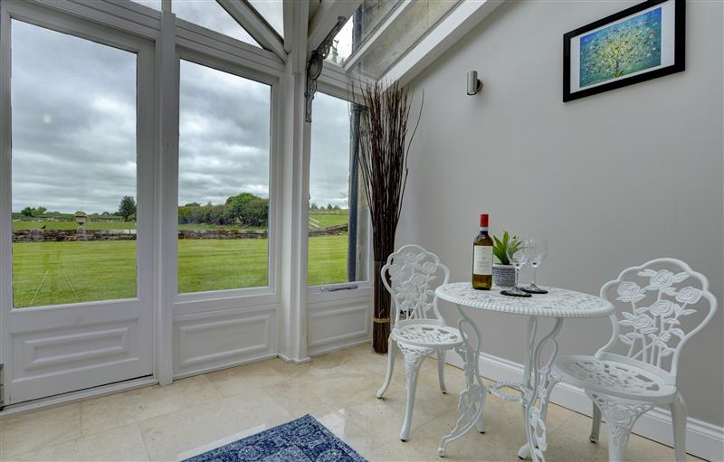 Enjoy the living room (photo 2) at The Farm House, Aldbrough St. John near Barton