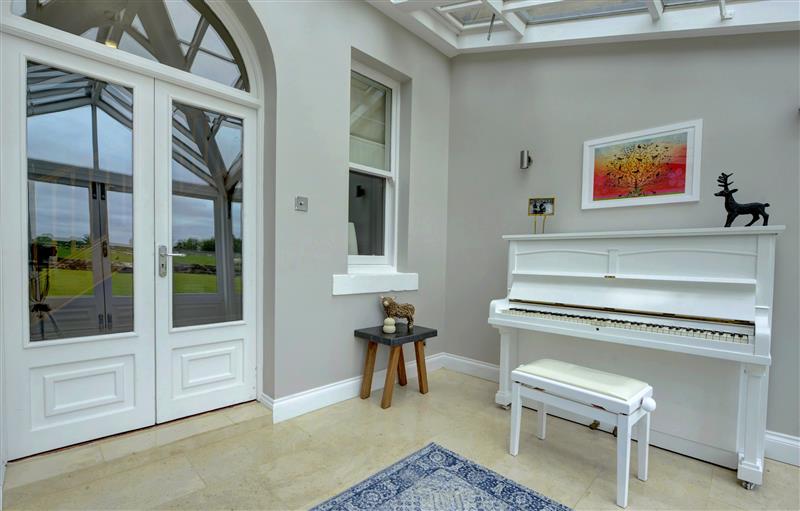 This is the living room (photo 3) at The Farm House, Aldbrough St. John near Barton