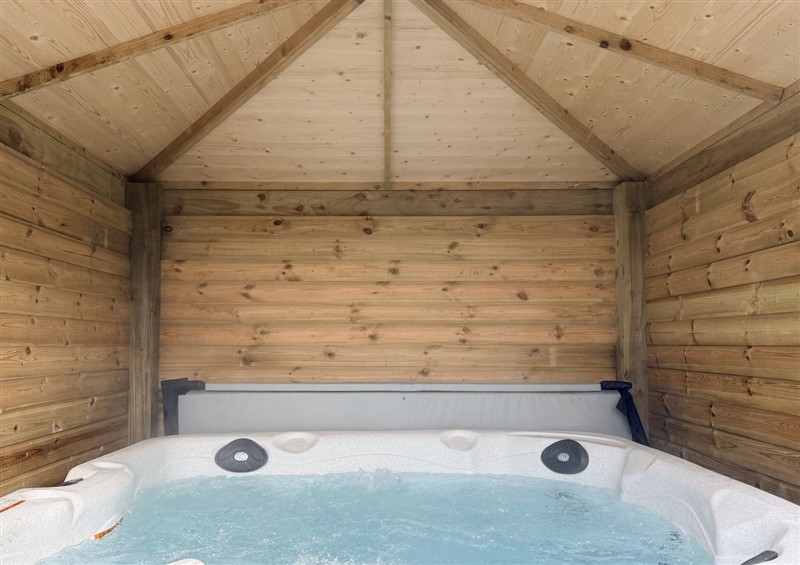 Enjoy the hot tub at The Farm House, Wigglesworth near Settle