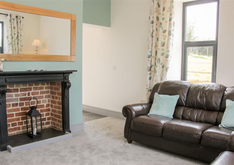 Relax in the living area at The Farm, Presteigne