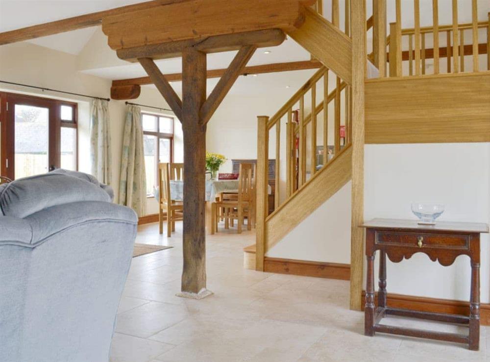 Large living space, with lots of character, beams throughout