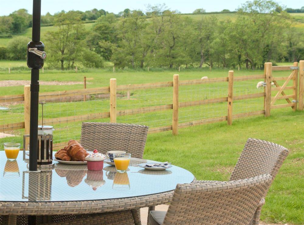 Scenic views from the patio area at The Farmhouse at Higher Westwater Farm in Axminster, Devon