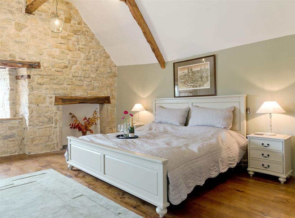 Spacious double bedroom with character at The Farmhouse at Higher Westwater Farm in Axminster, Devon