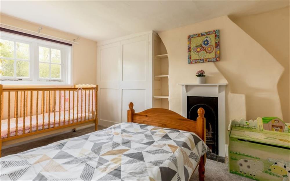 This is a bedroom at The Farmhouse in Brockenhurst