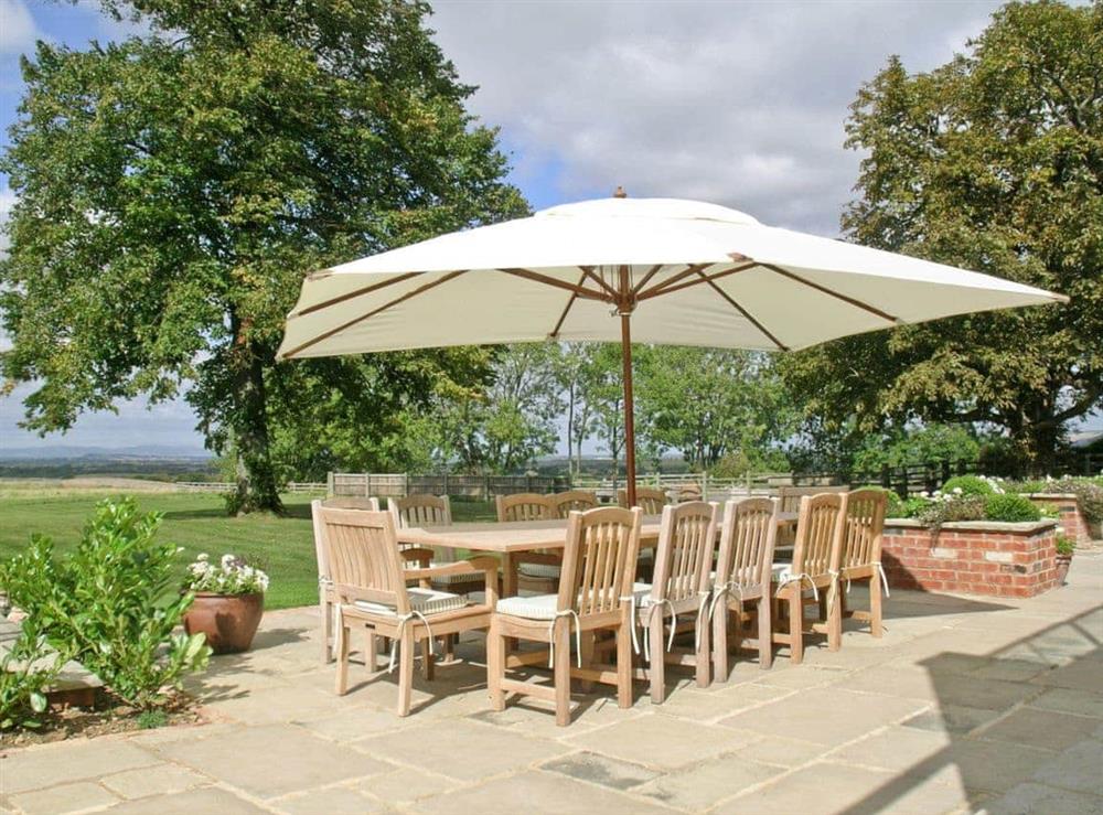 Sitting-out-area at The Farmhouse in Cheltenham, Glos., Gloucestershire