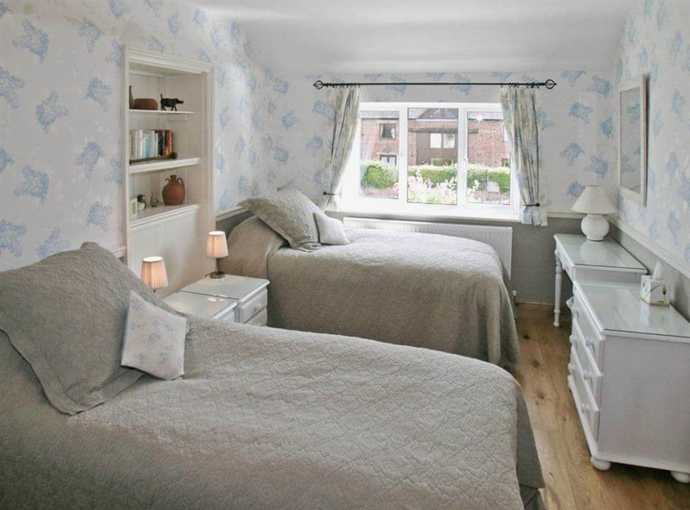 Twin bedroom at The Farmhouse in Cheltenham, Glos., Gloucestershire