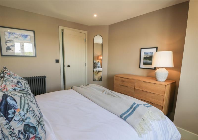 One of the 3 bedrooms at The Farmhouse, Llanfechell
