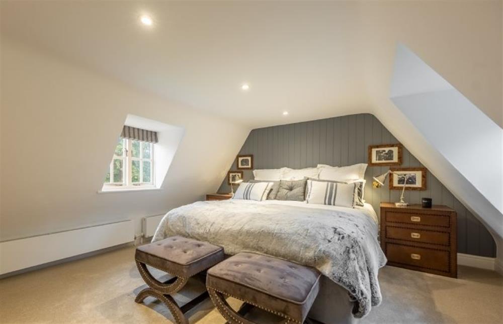 Bedroom six (Conyers) with a 6’ super-king size zip and link bed at The Farmhouse, Nether Hall Estate, Pakenham