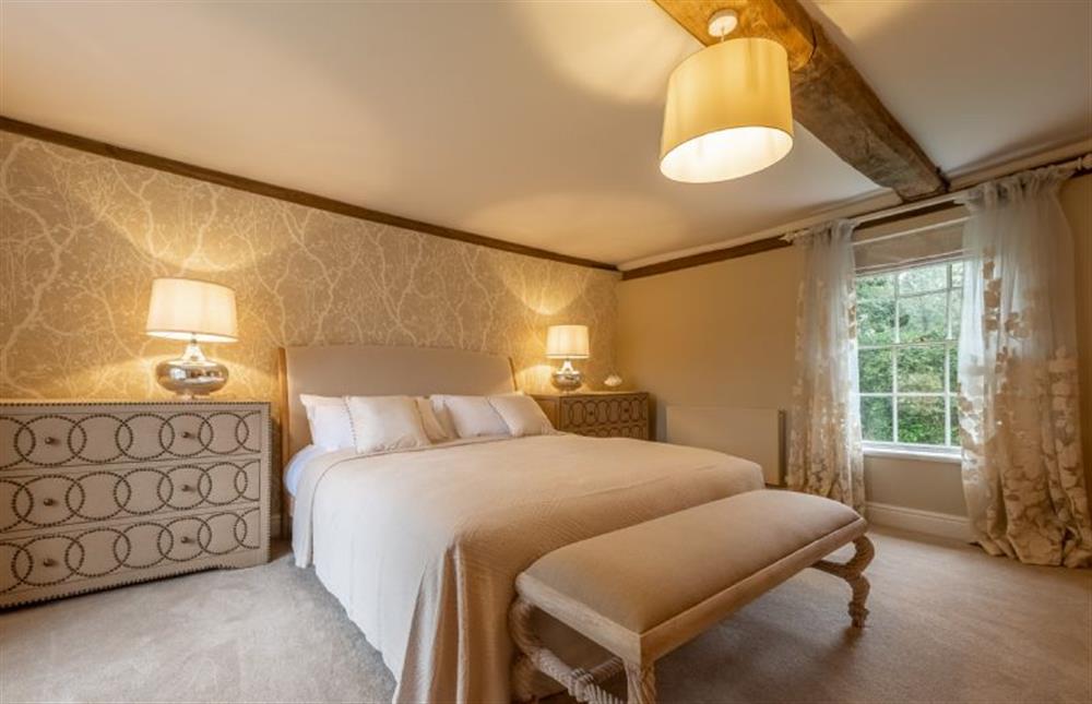 Bedroom two (The Laies) with a 6’ super-king size bed (photo 2) at The Farmhouse, Nether Hall Estate, Pakenham