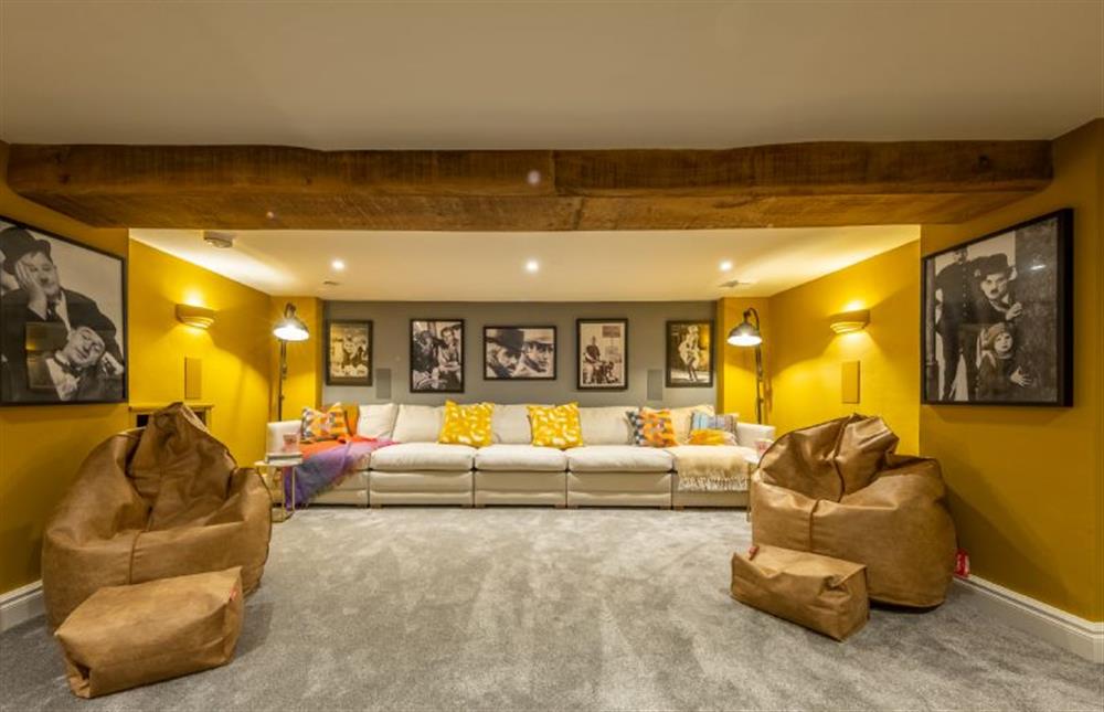 Cinema room with 75 inch Smart television and surround sound at The Farmhouse, Nether Hall Estate, Pakenham
