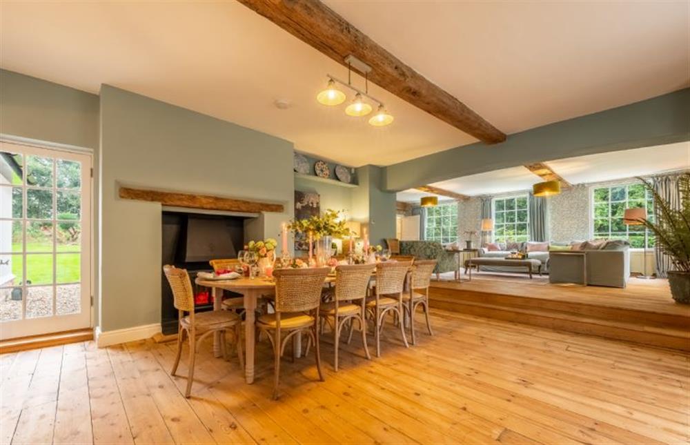 Dining room with views of the drawing room at The Farmhouse, Nether Hall Estate, Pakenham